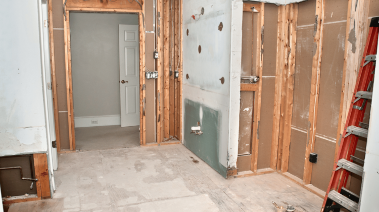 Bathroom under remodel construction with no fixtures