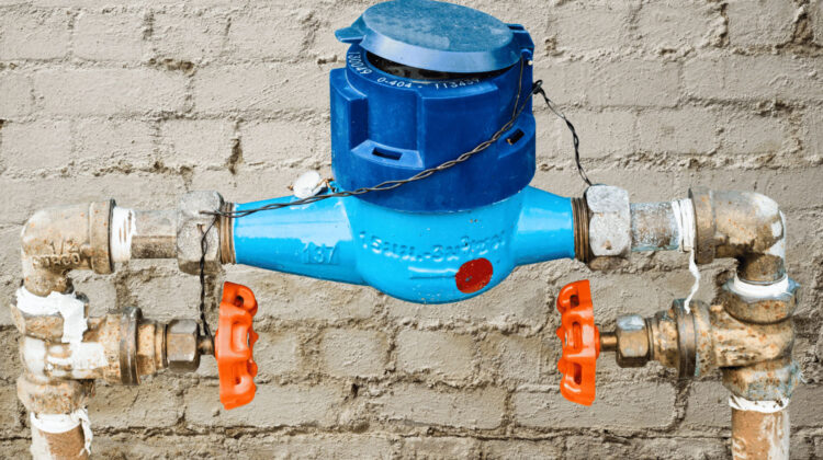 Residential water meter in old basement